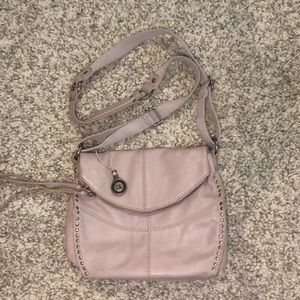 The Sak brand crossbody purse